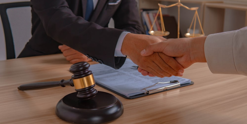 Criminal defence lawyer consulting a client about sexual assault charges in Canada