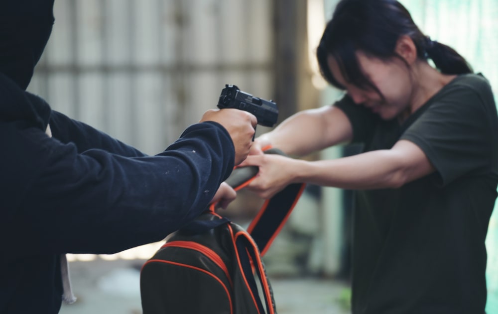 Armed robbery scene showing assault with a weapon in Canada